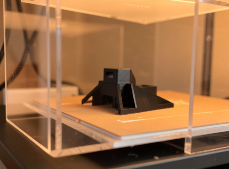 ABS part printing inside a warm enclosed 3D printer chamber
